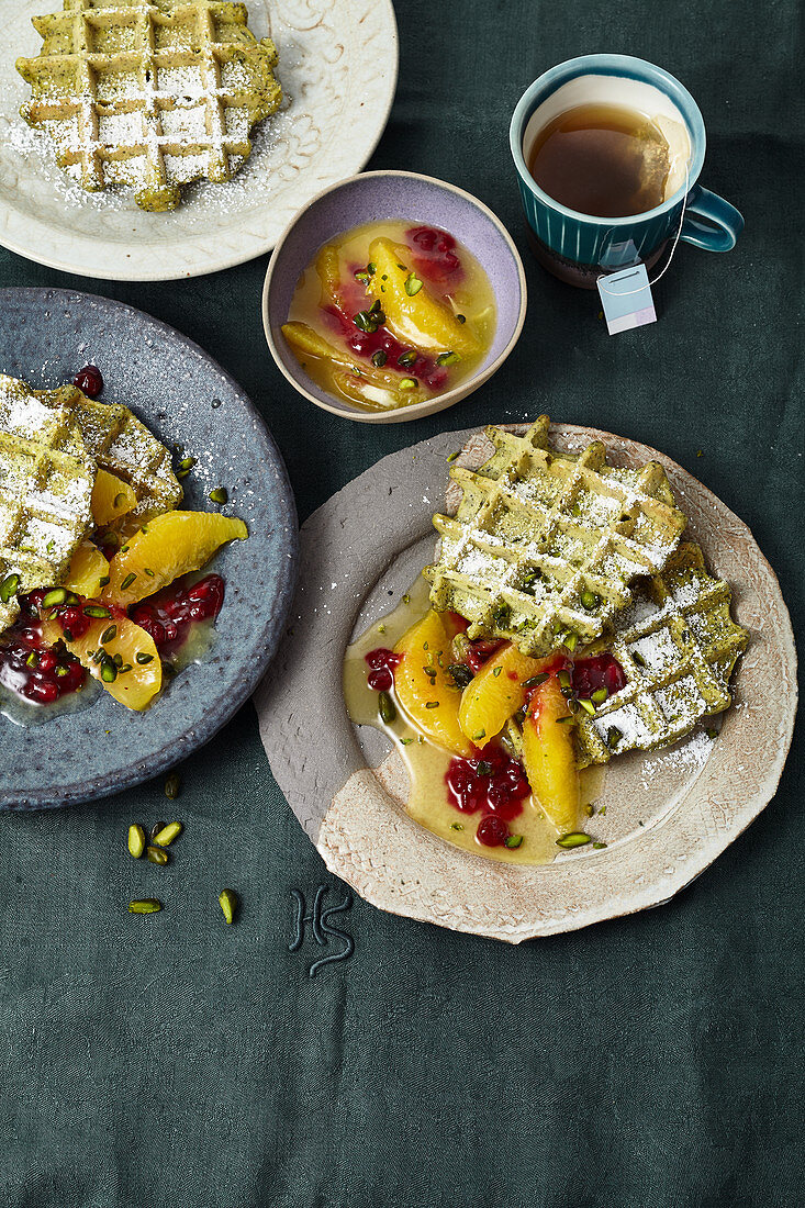 Poppy seed and pistachio waffles with orange and cranberry compote
