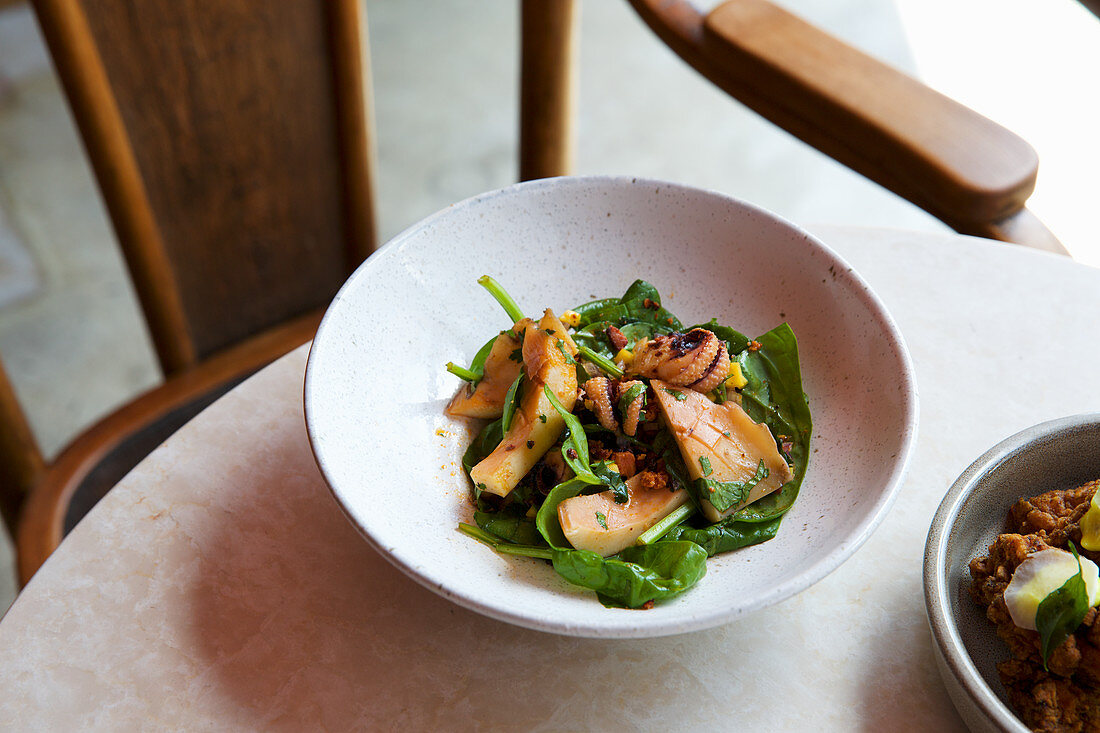 Fried squid on lettuce