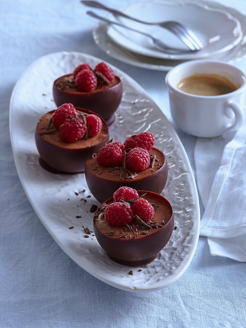 Mousse au chocolate with rum and raspberries