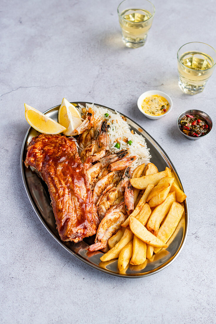 Platter of Prawns, Ribsm Chips, Rice, Sauces and Wine