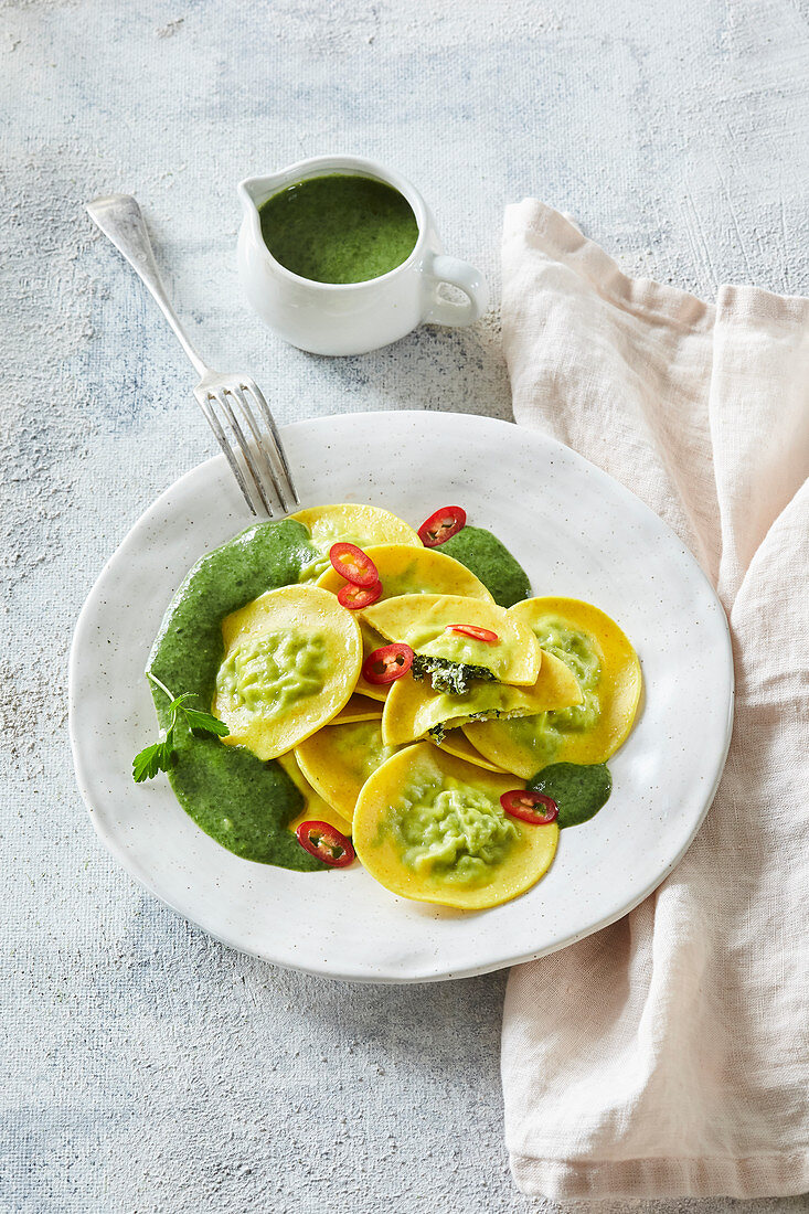 Ravioli with spinach sauce