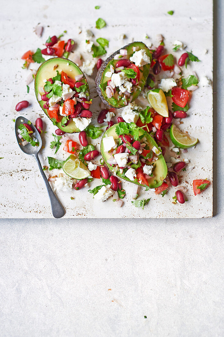 Stuffed avocado with spicy beans and feta