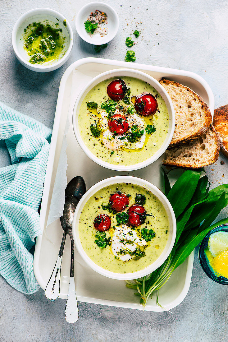 Wild garlic soup with egg and cherry tomatoes