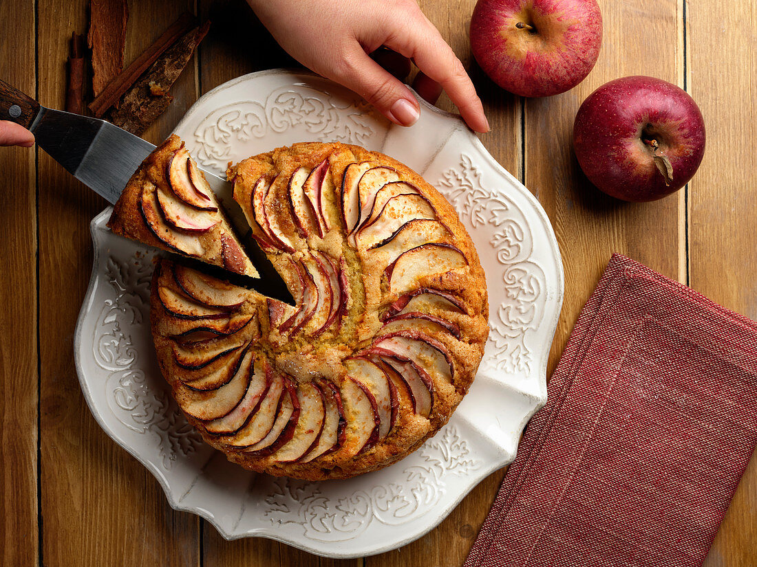 Cutting apple cake