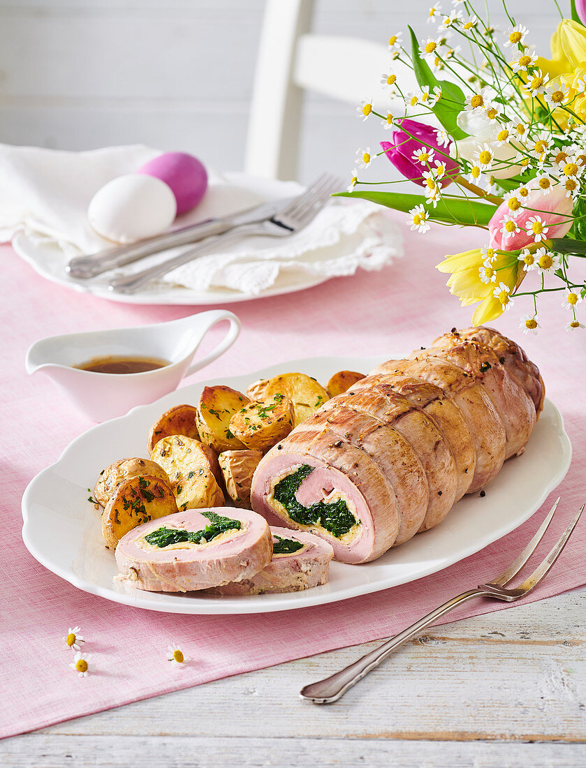 Veal rolls with parmesan omelette and spinach