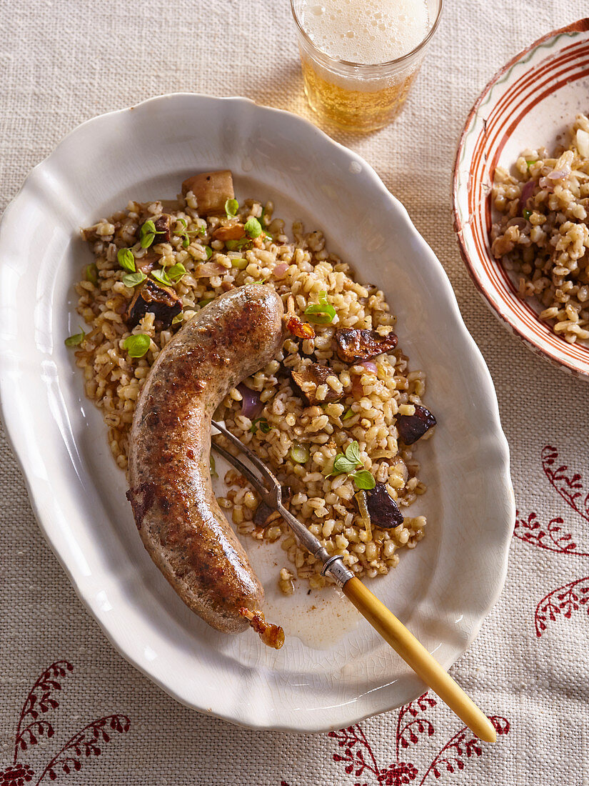White pudding with groath risotto and mushrooms
