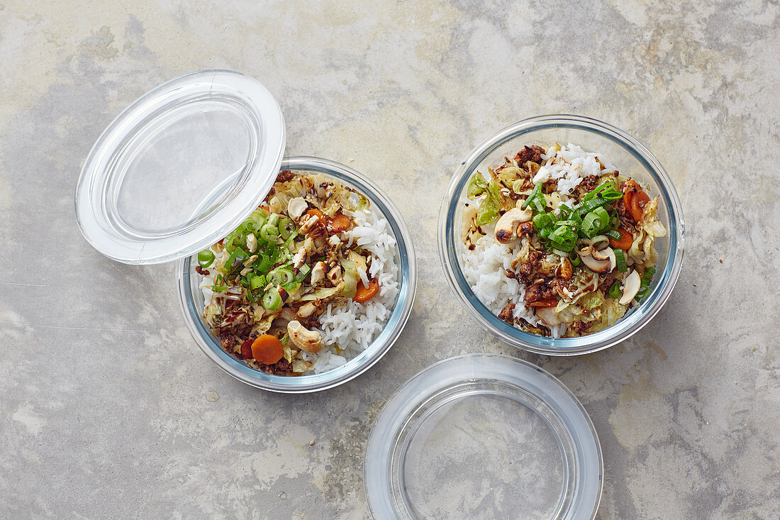 Exotic cashew nut stir-fry with white cabbage and minced beef in a jar
