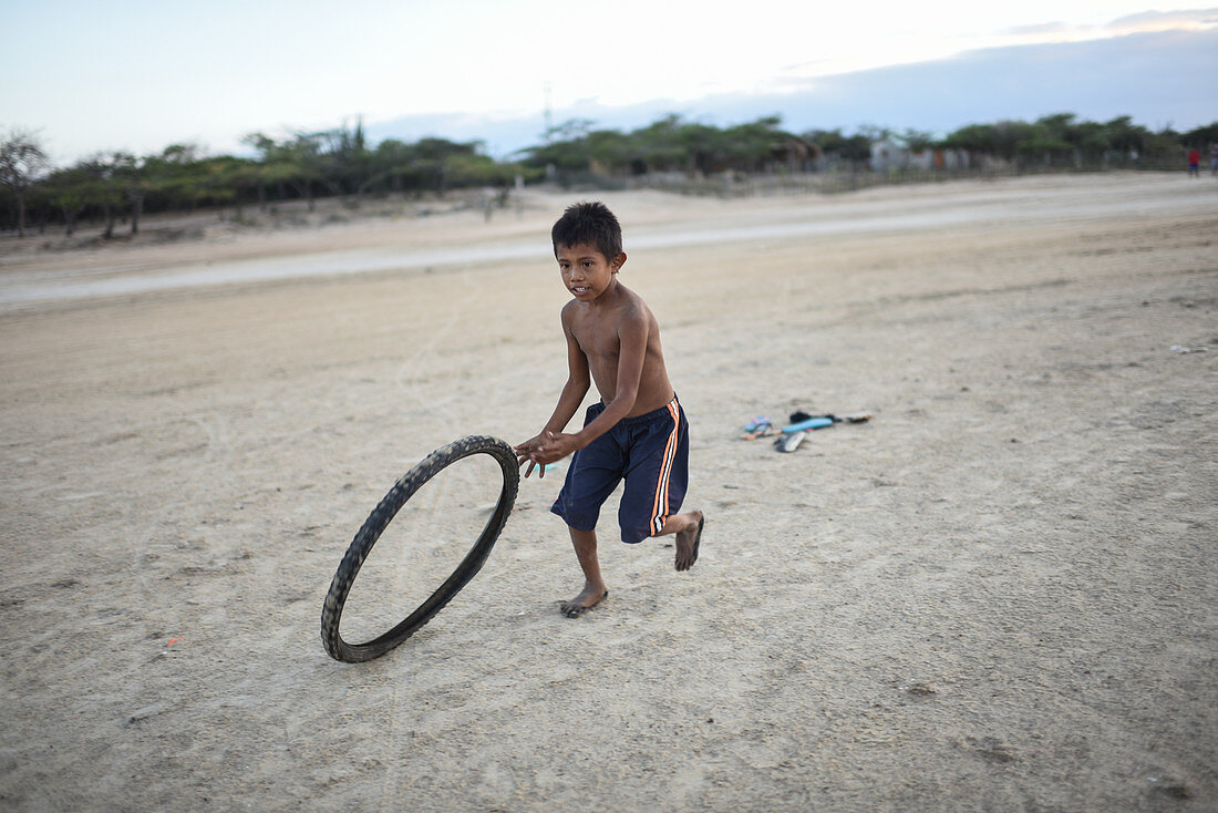 Wayuu indigenous child playing, Colombia