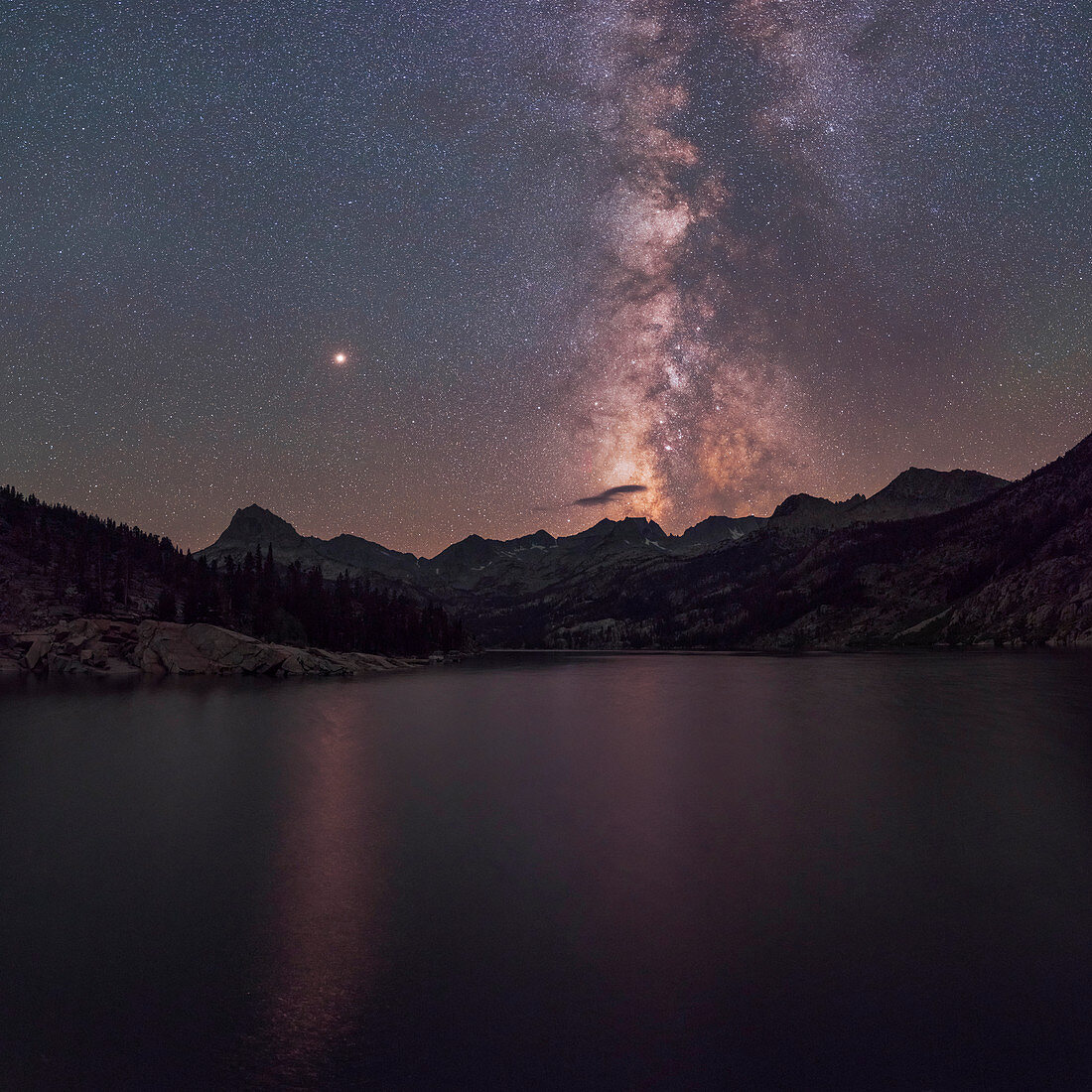 Milky Way and Mars over a mountain lake