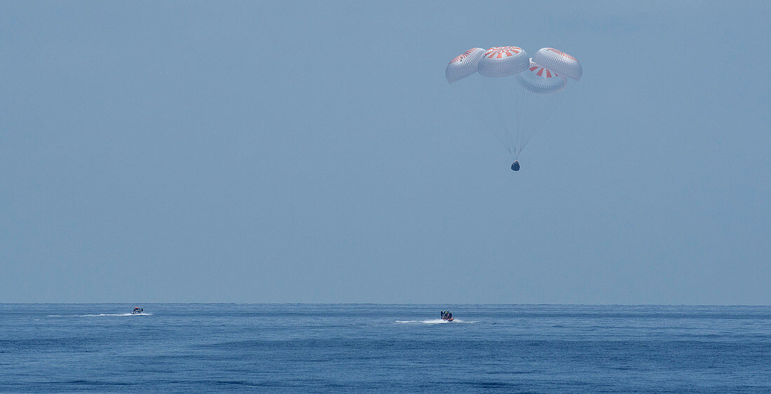 SpaceX Demo-2 parachuting back to Earth