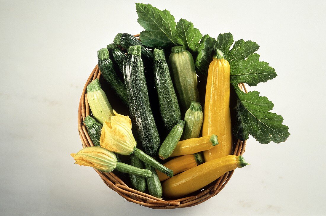 Assorted Zucchini in a Wicker Basket