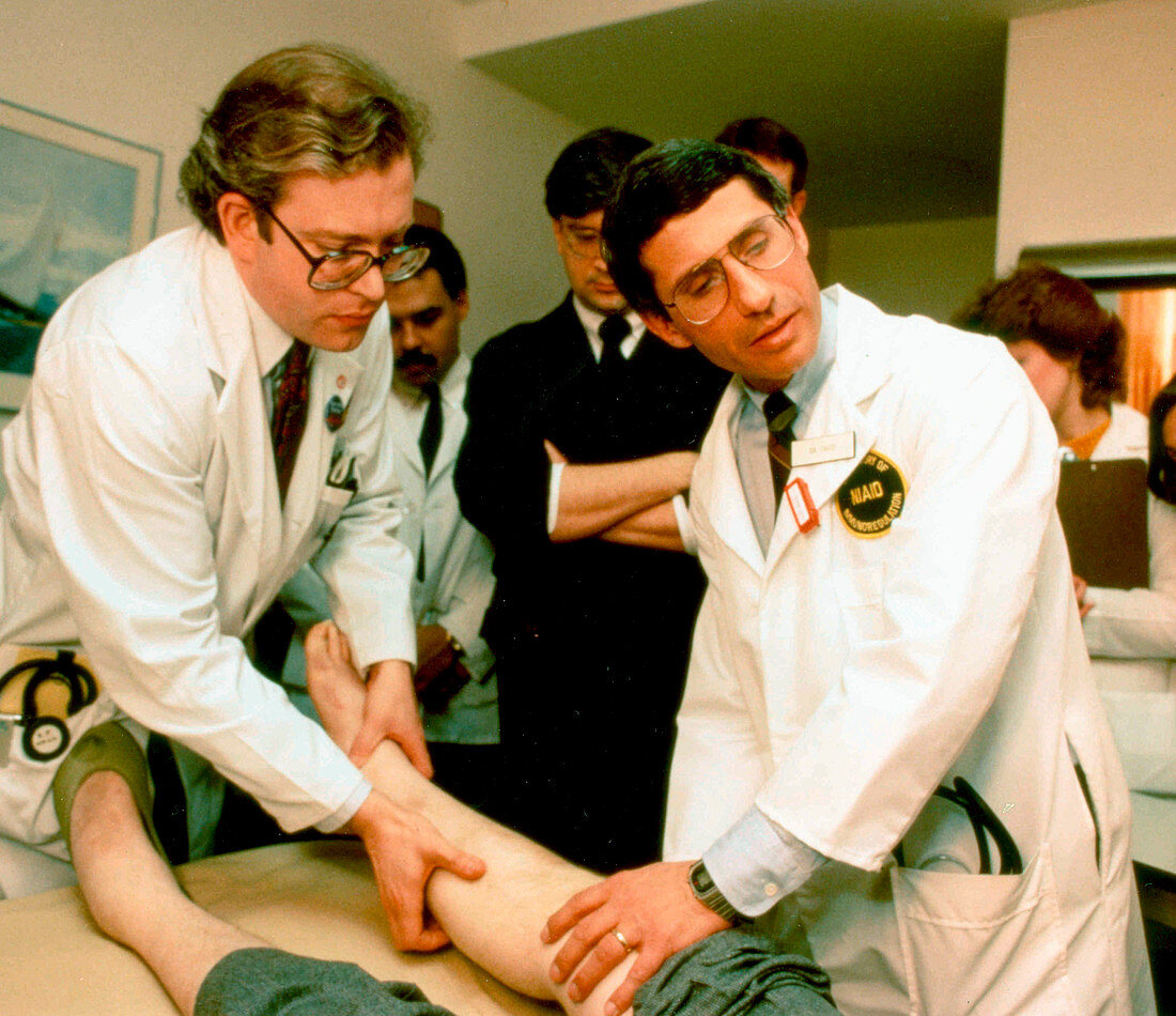 Anthony Fauci examining a patient during early AIDS epidemic