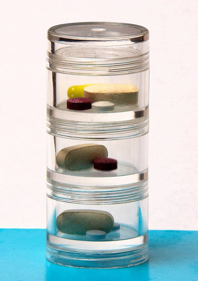 Tower pill and tablet dispenser
