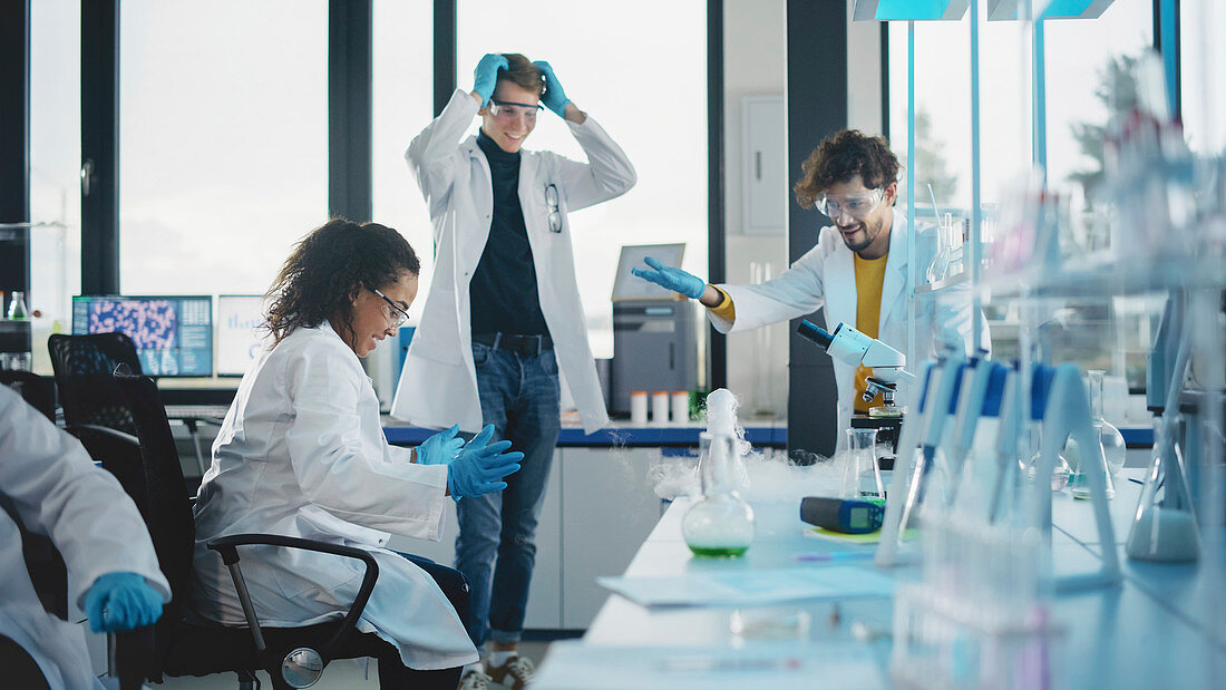 Scientists working in laboratory