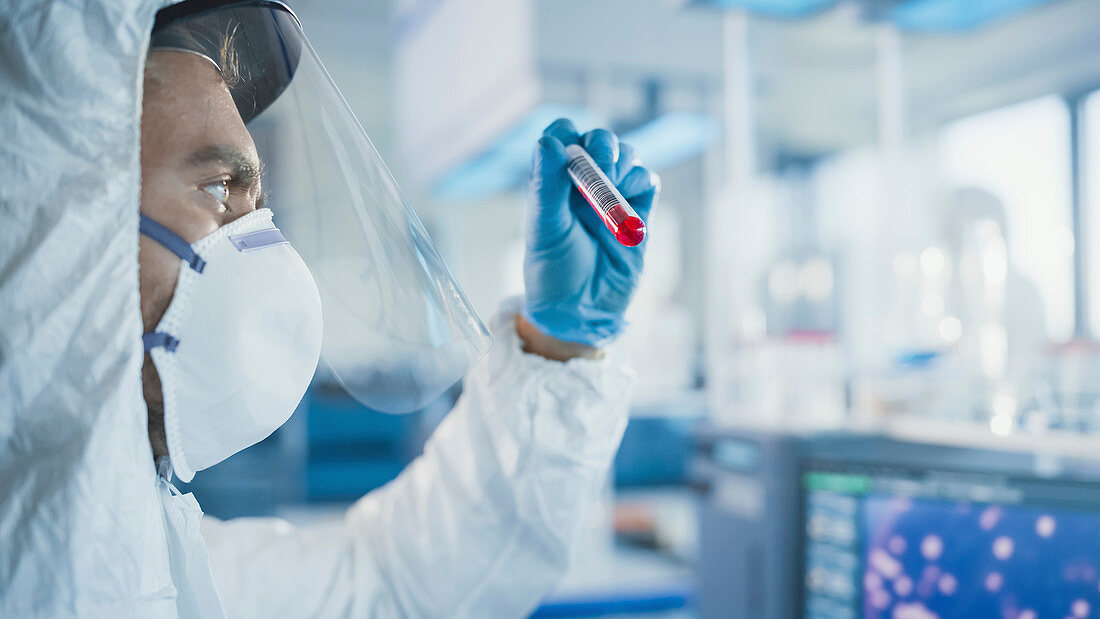 Scientist holding a test tube in a laboratory