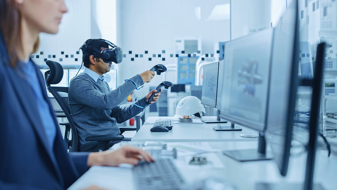 Engineer wearing a virtual reality headset