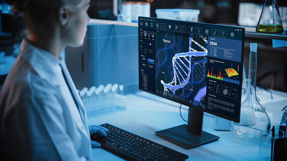 Scientist using a computer in a laboratory