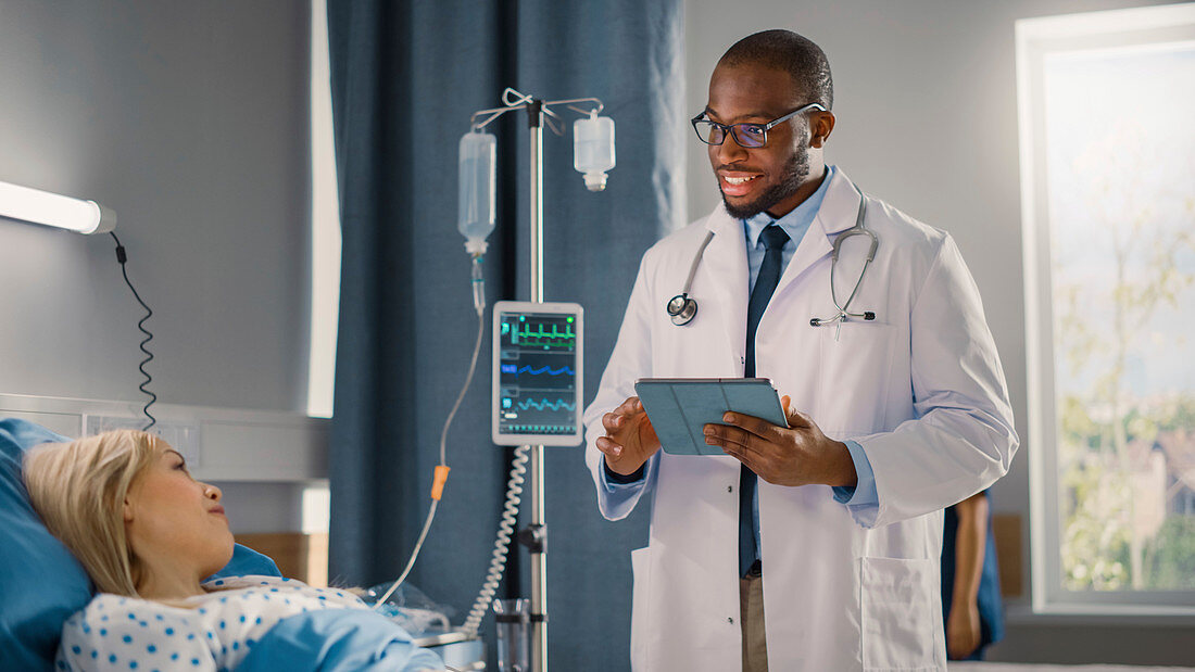 Doctor using digital tablet