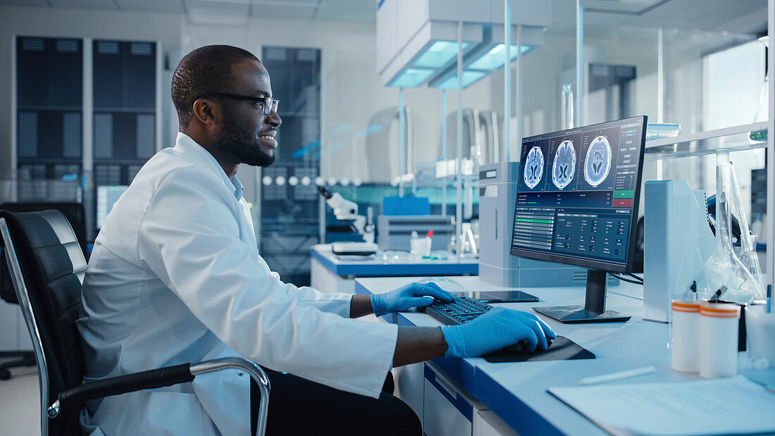 Scientist using a computer in a laboratory