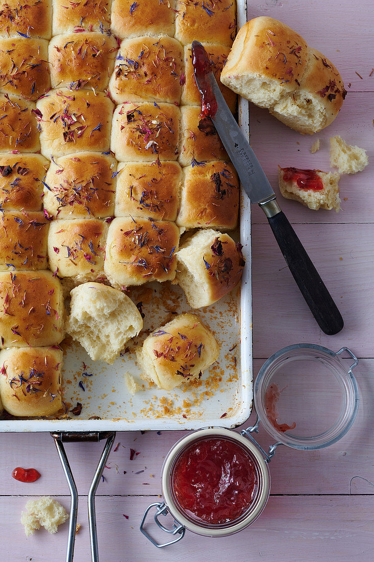 Sweet bread rolls on a baking sheet