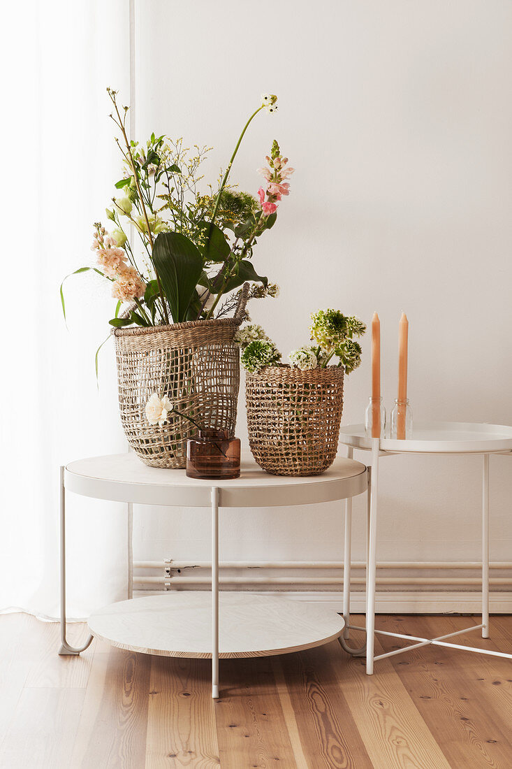 Bouquets in wicker vases