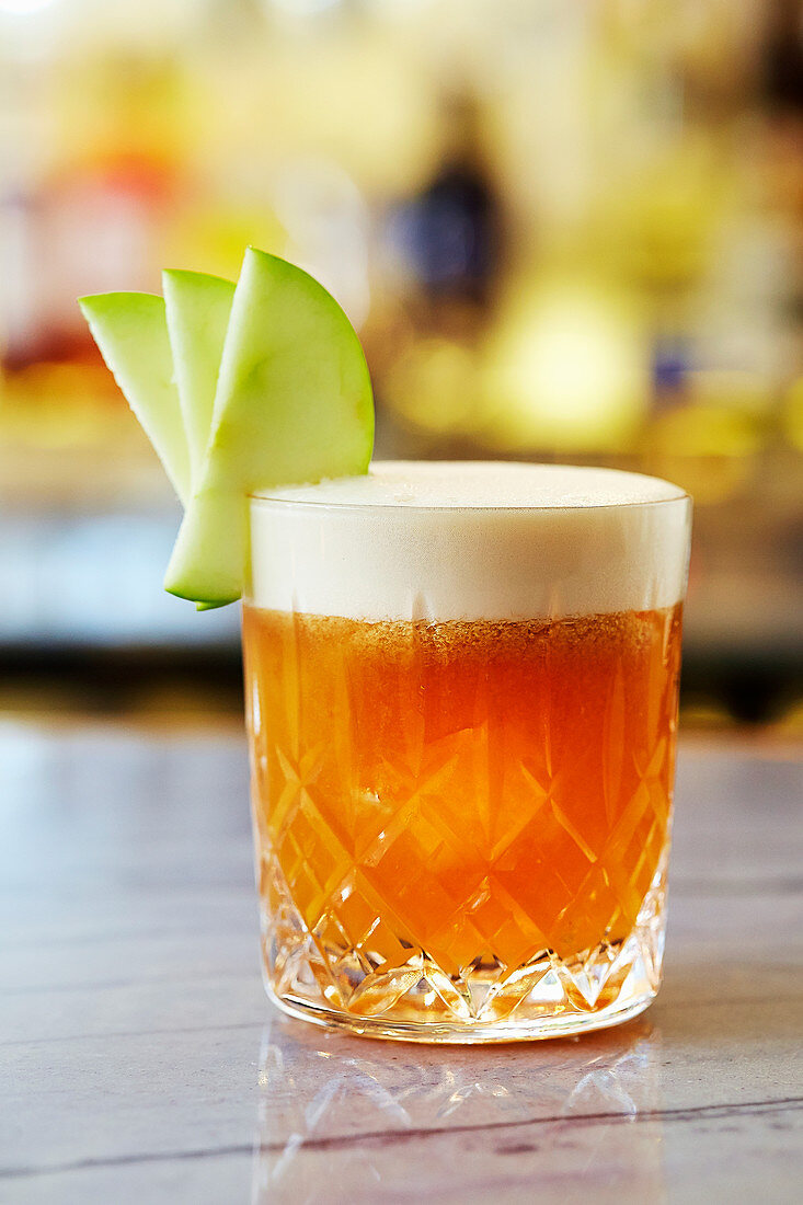 Cracking candy apple sour cocktail