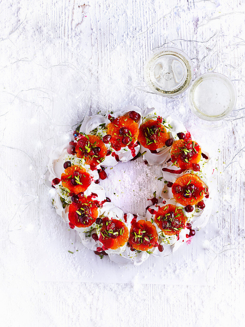 Clementine, cranberry and pistachio meringue wreath