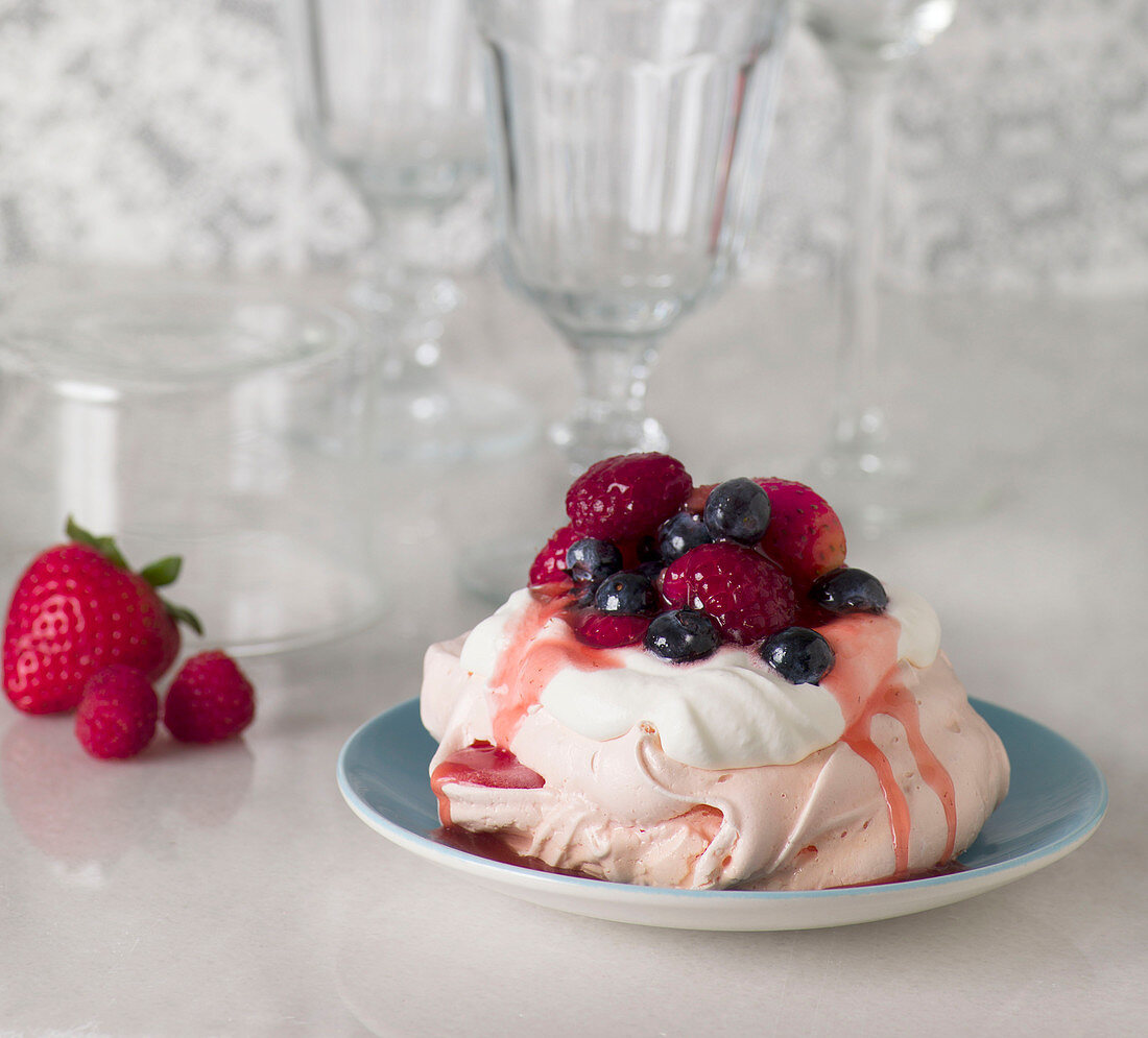 Mini pavlova with fresh berries and cream