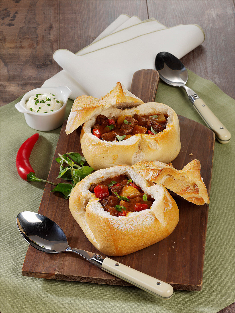 Hungarian style goulash soup served in bread rolls