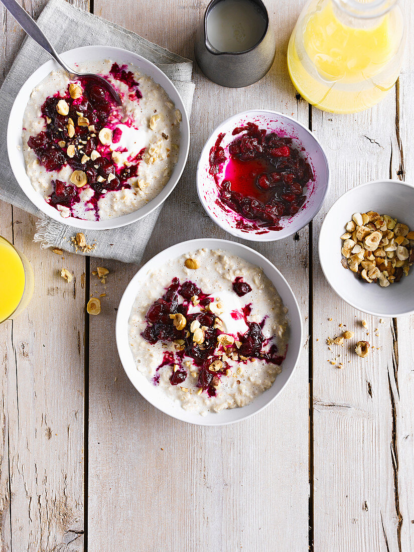 Porridge with beetroot, apple and cranberry compote and toasted hazelnuts