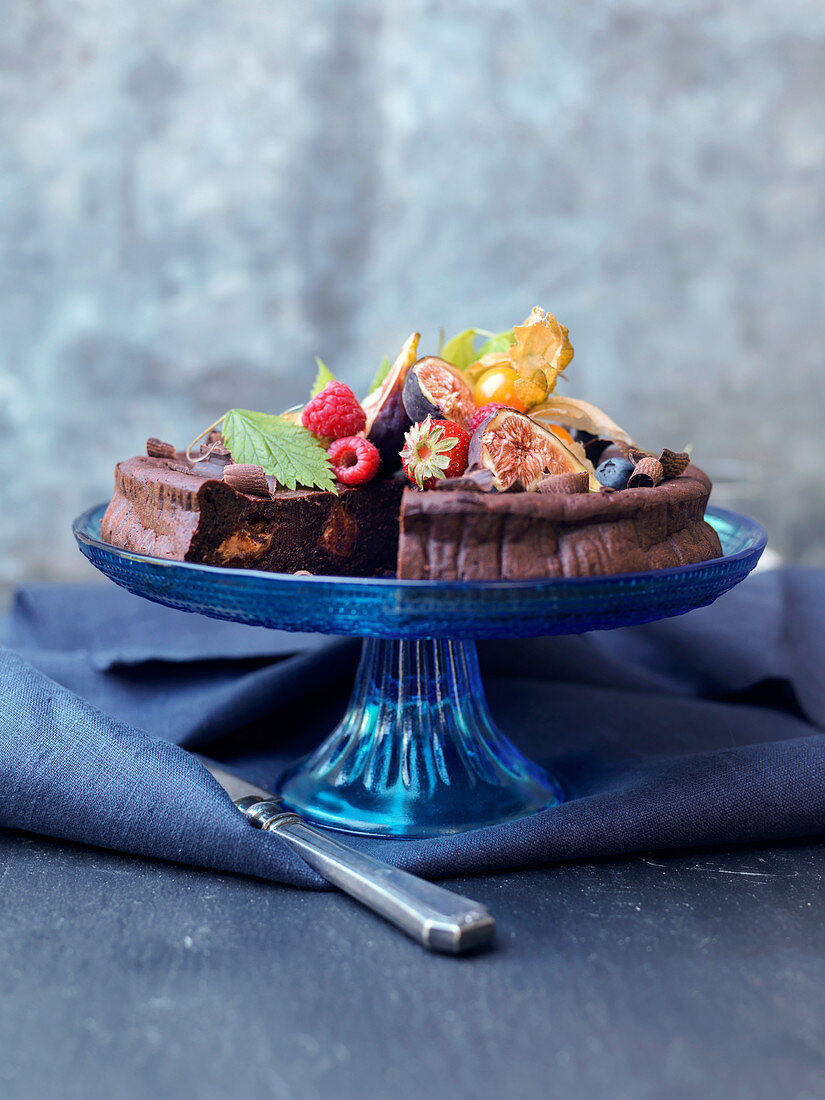 Fruit Topped Chocolate Cake On Cake Stand Topped