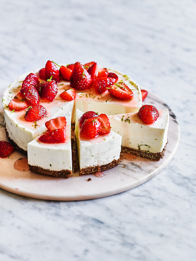 Lime Cheesecake with Coconut Crust, Strawberries and Passionfruit Sauce