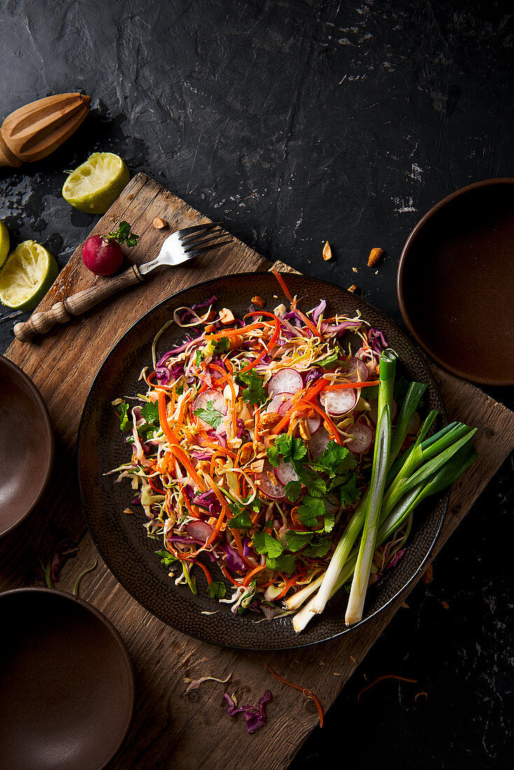 Crunchy cabbage and veg slaw with lime, peanuts and coriander