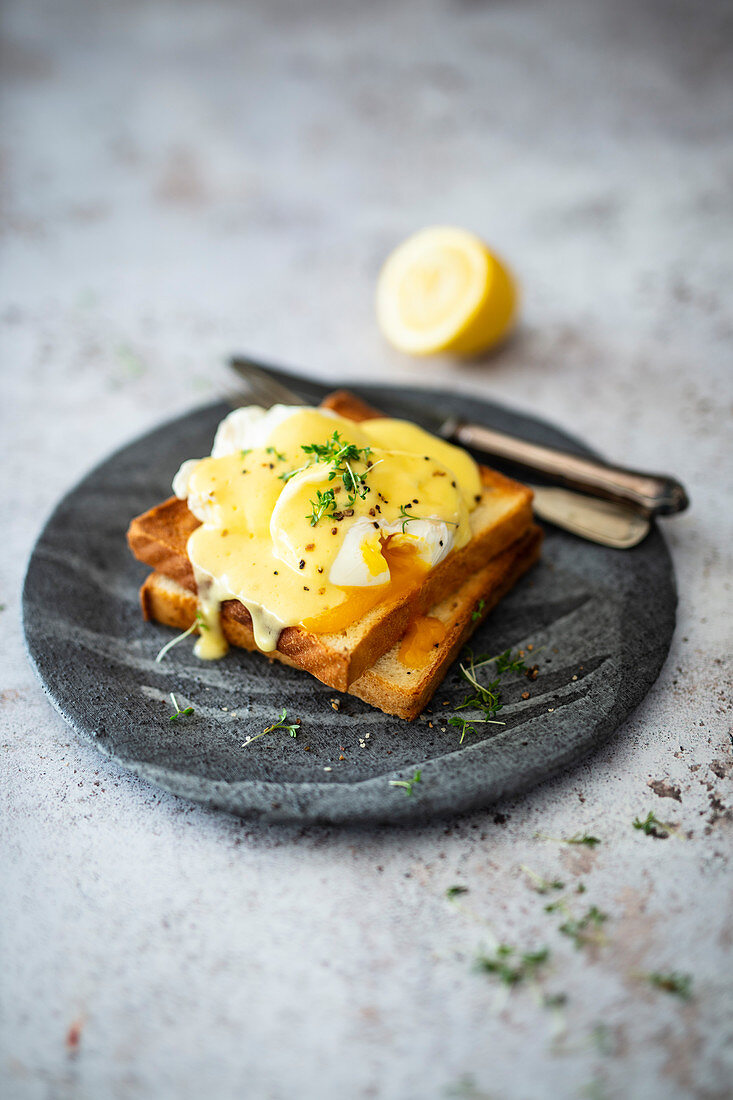 Egg Benedict (poached eggs with hollandaise) on toast