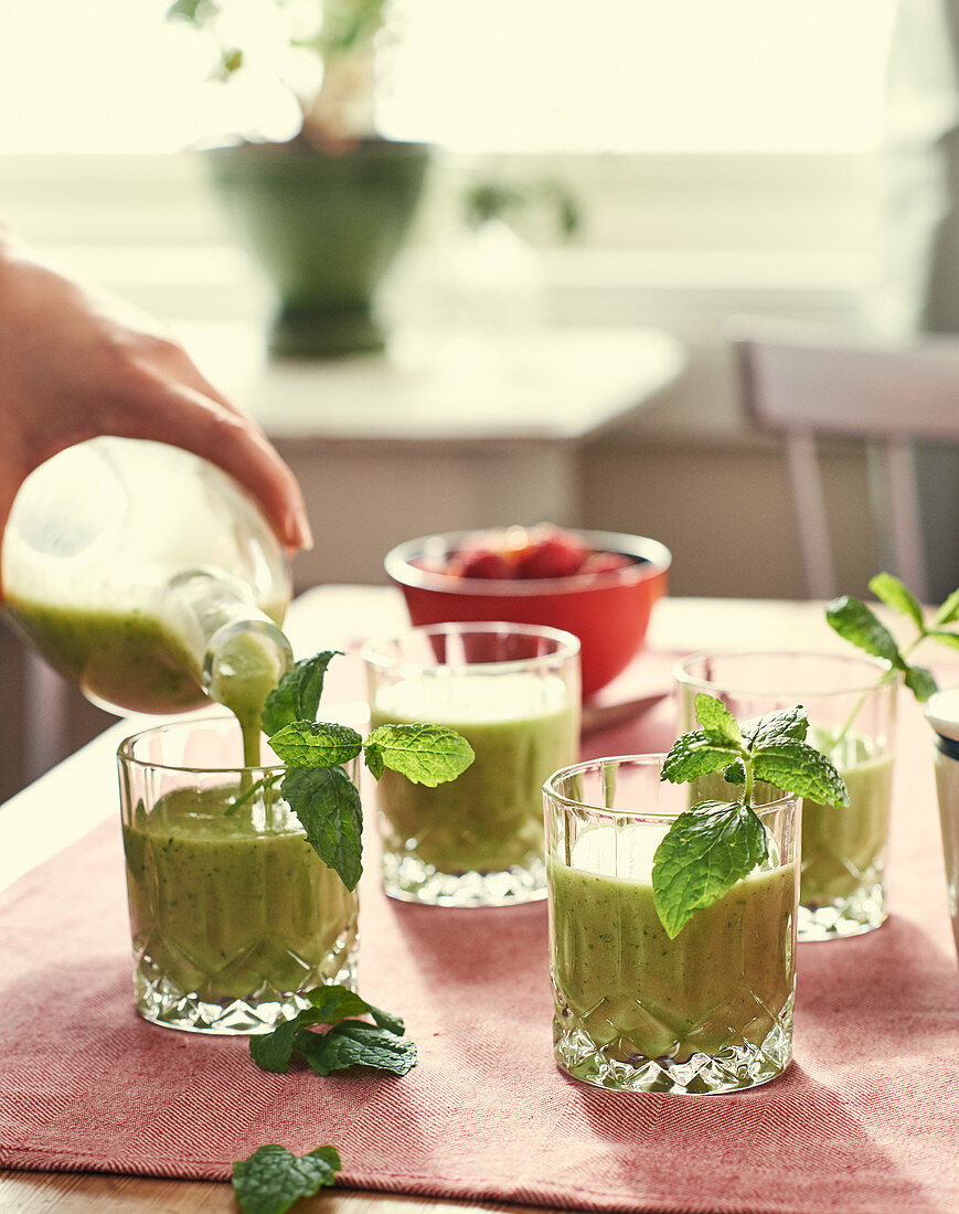 A green smoothie made with avocado and spinach