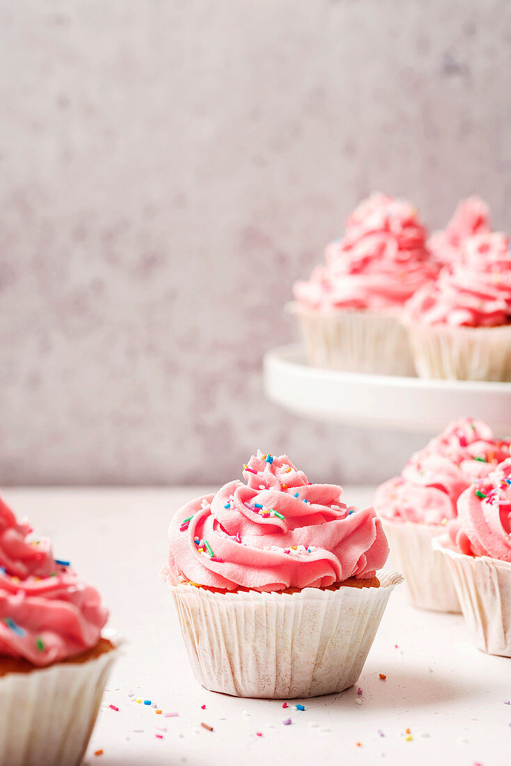 Pink vanilla cupcakes with vanilla butter cream