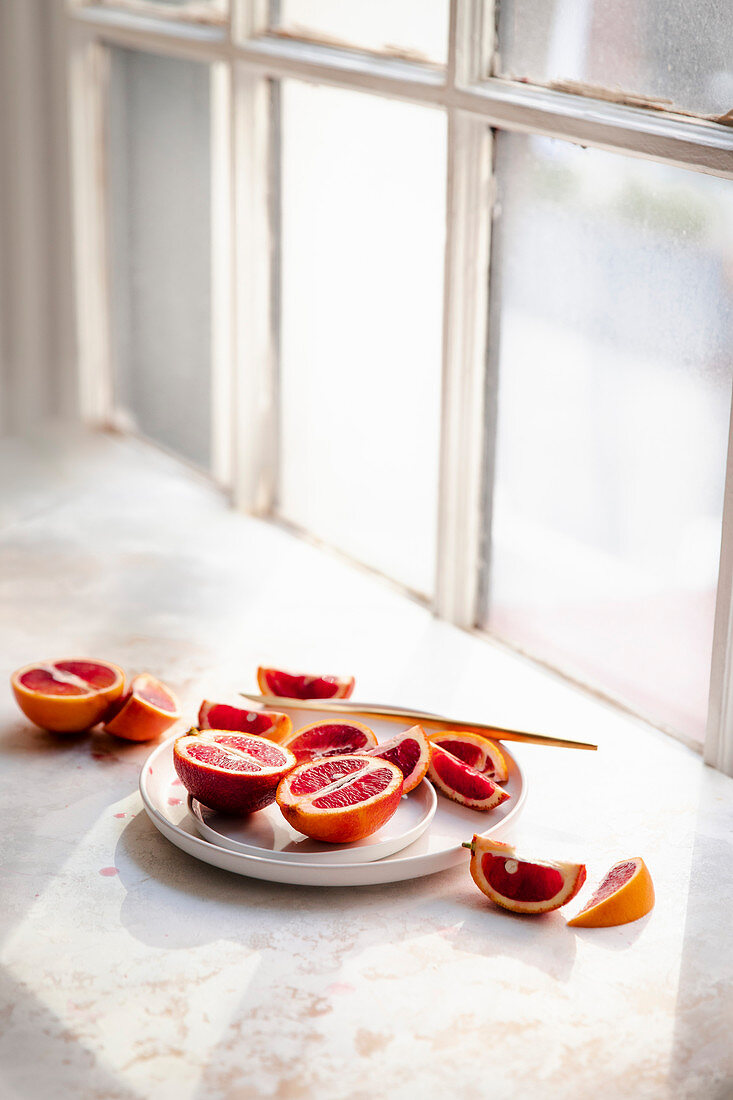 Blood oranges sliced on a plate