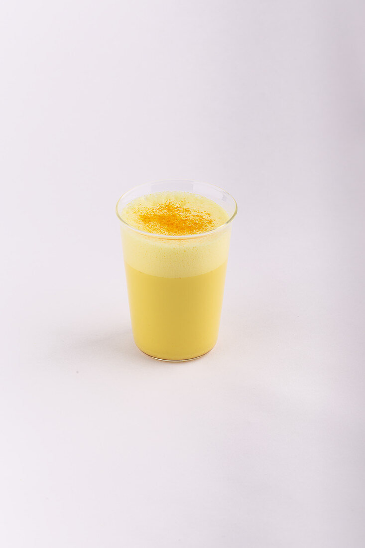 A glass of golden milk