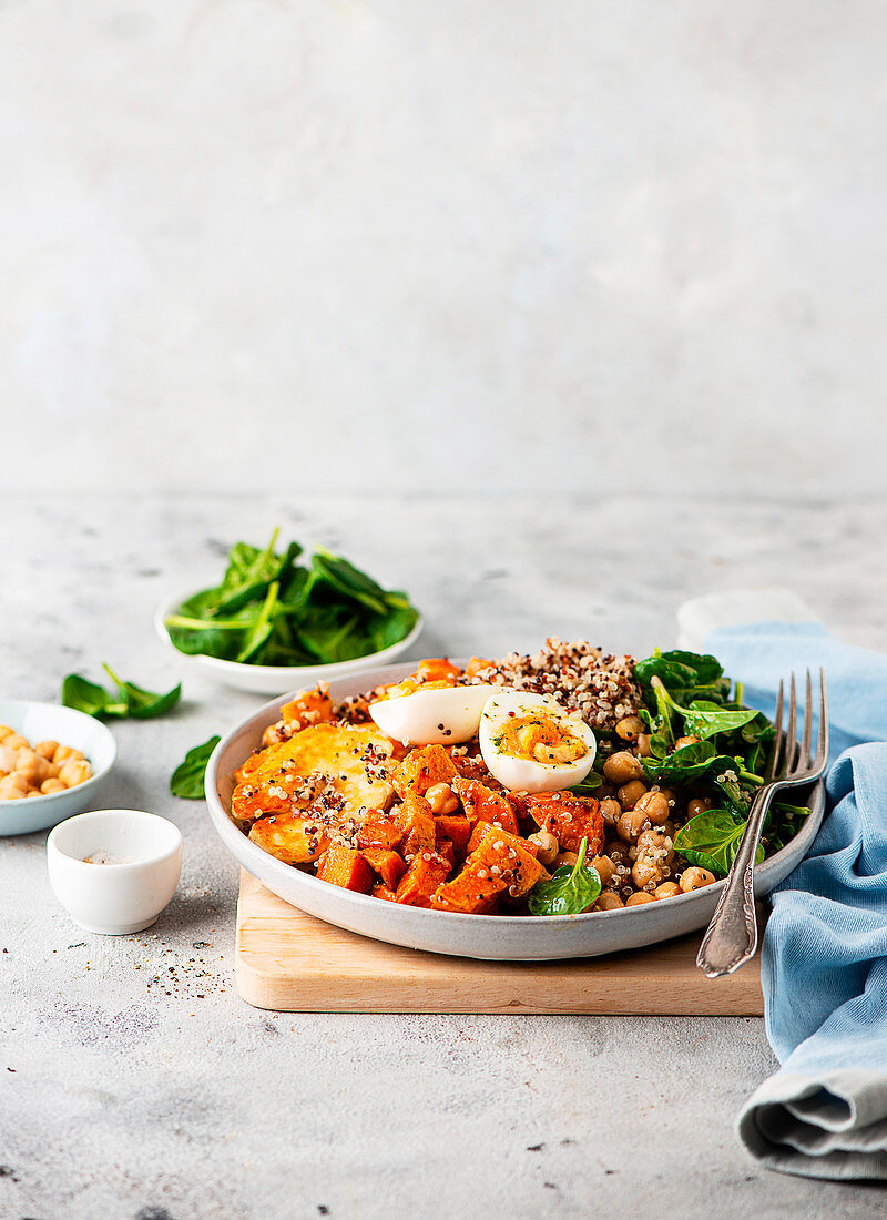 Quinoa bowl with sweet potatoes and hard-boiled eggs