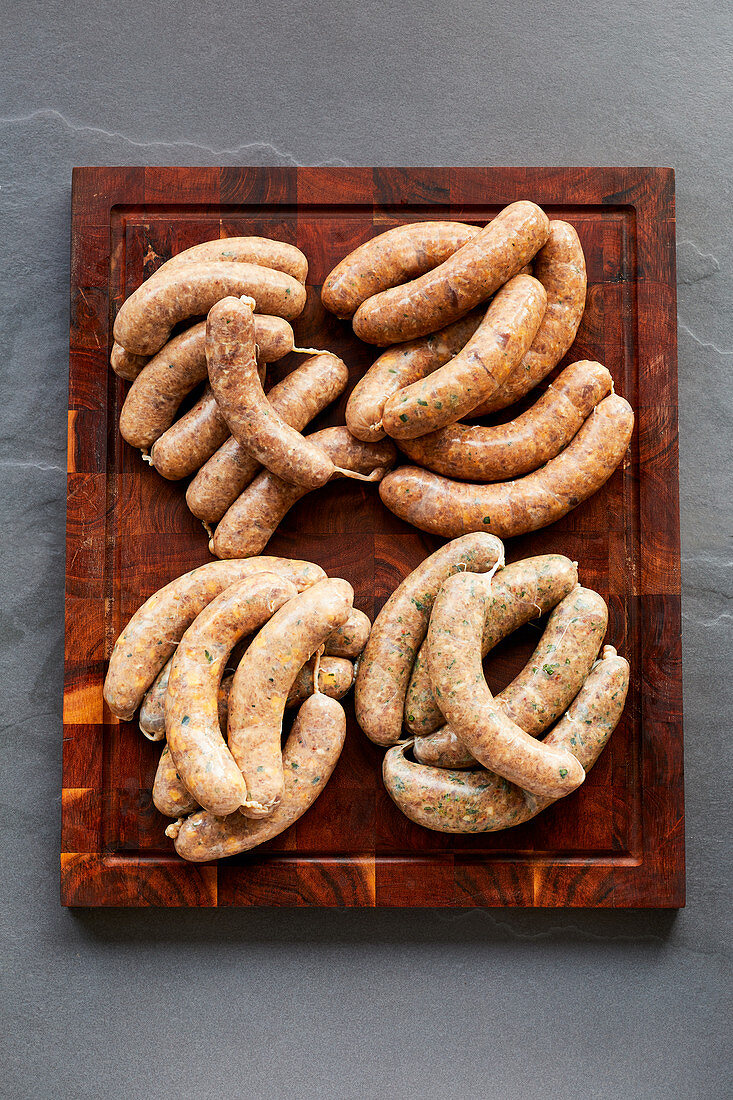 Raw homemade BBQ sausages