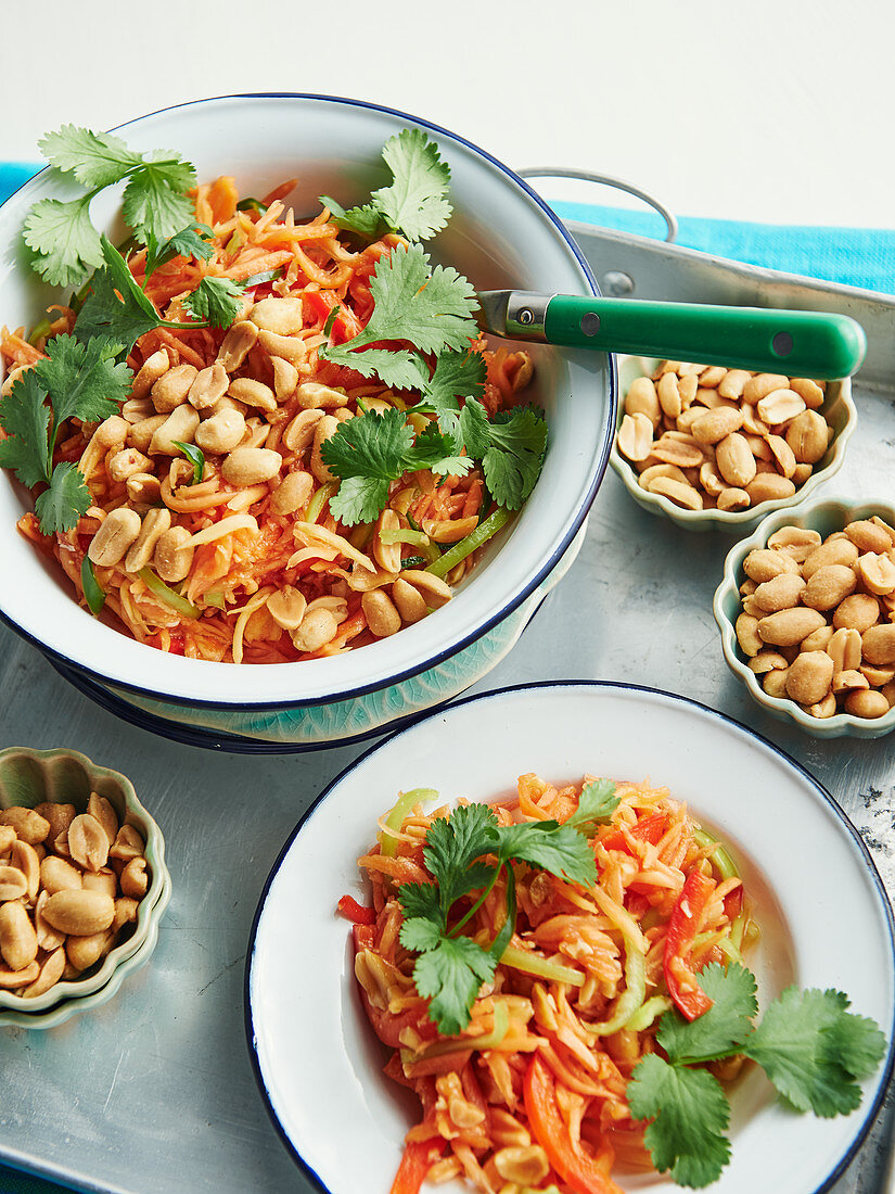 Thai salad with carrots, papaya and peanuts