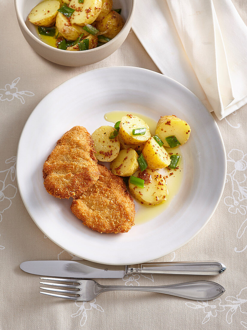 Schnitzel from tenderloin with potato salad