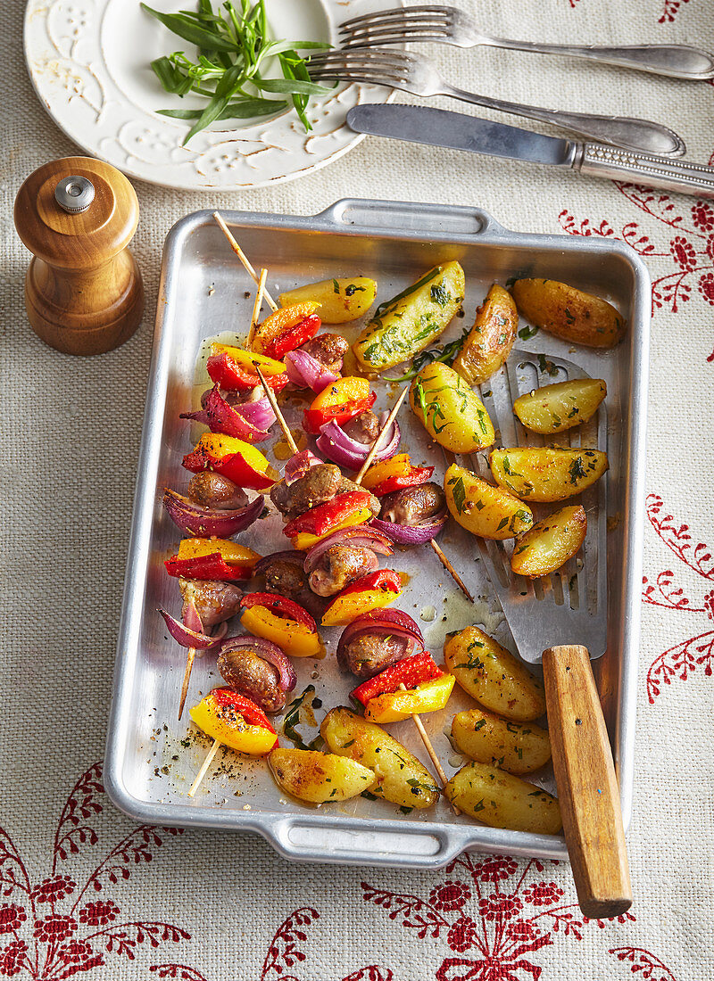 Shashlik from chicken hearts with pepper and potatoes