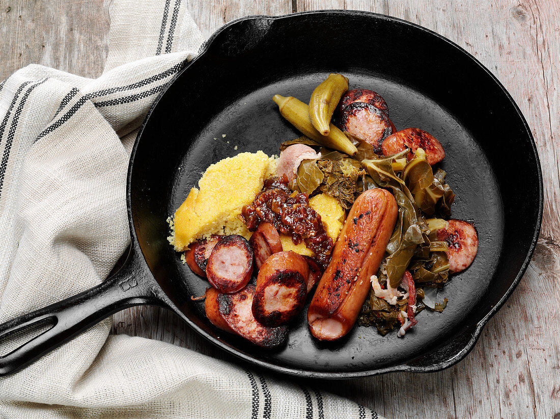 Smoked sausage with bacon onion jam, cornbread and Okra