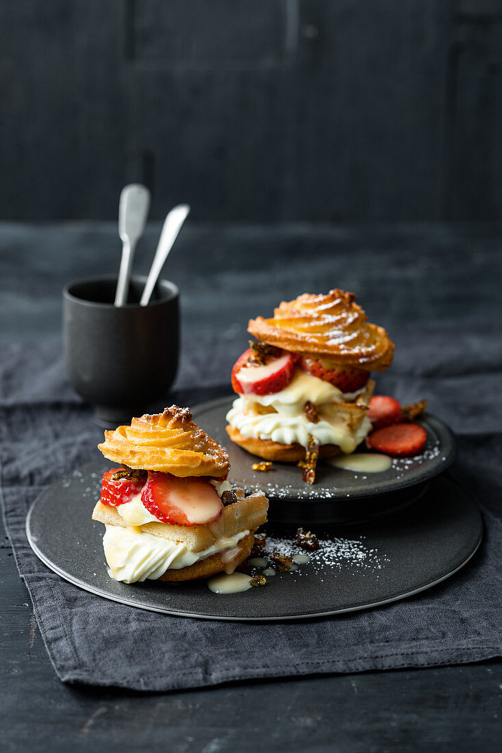 Cream puff burger with strawberries, eggnog cream and rosemary brittle