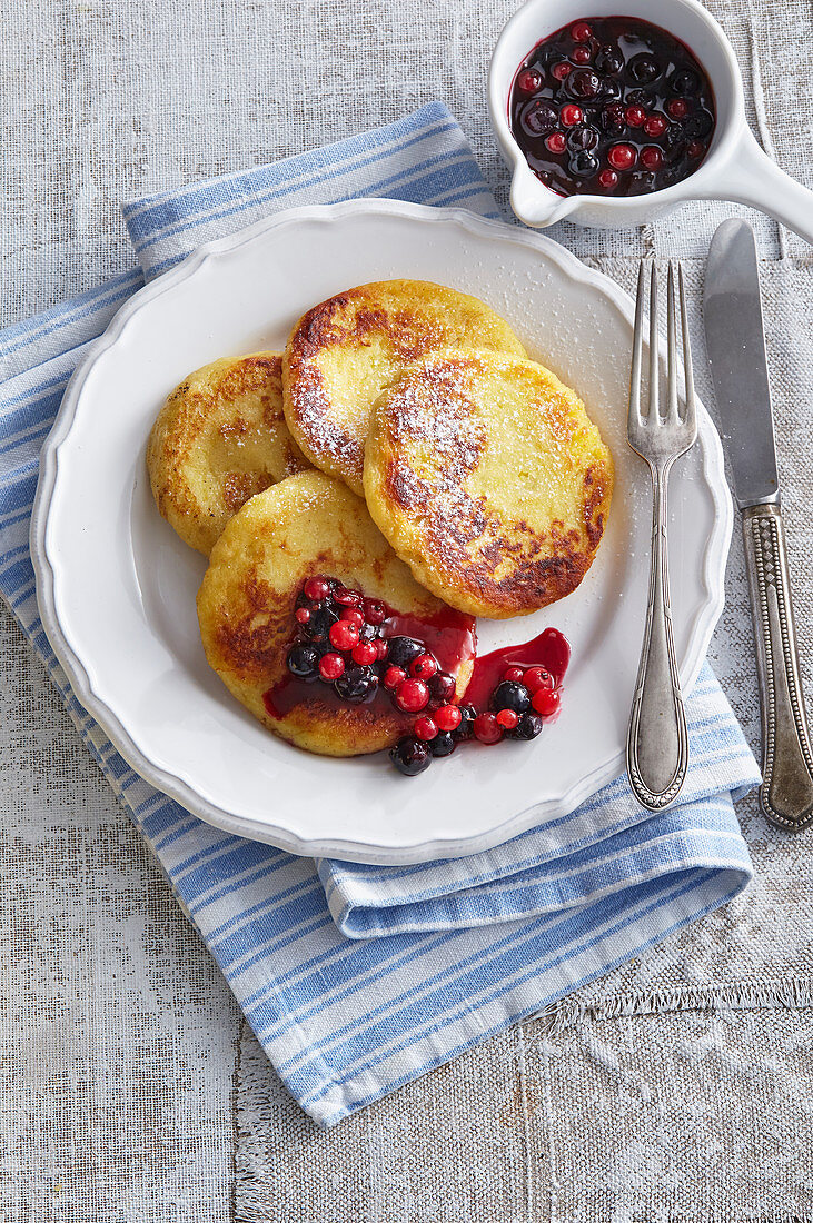Potato pancakes with fruit coulis