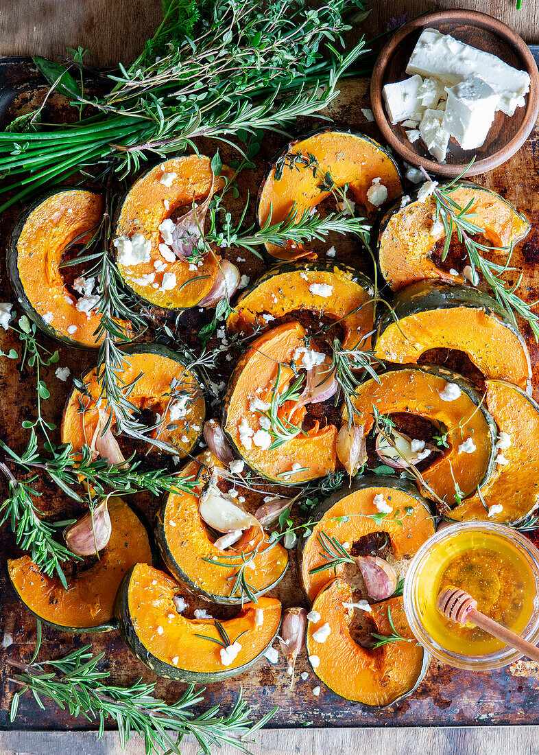 Roasted pumpkin wedges with herbs and honey