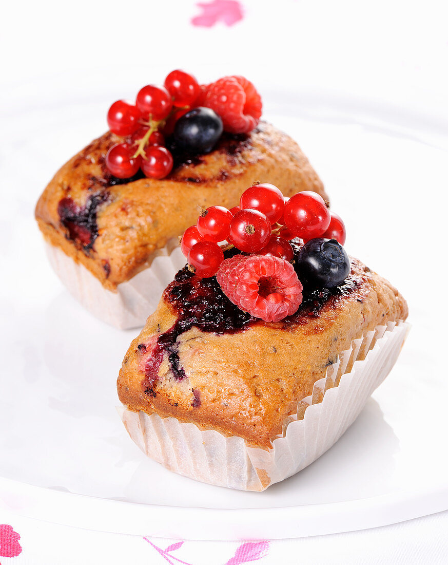 Small plumcakes with berries