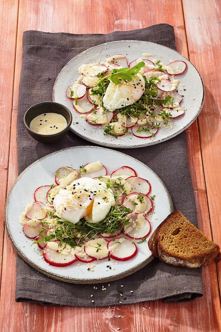 Radish carpaccio with tahini dressing and poached eggs