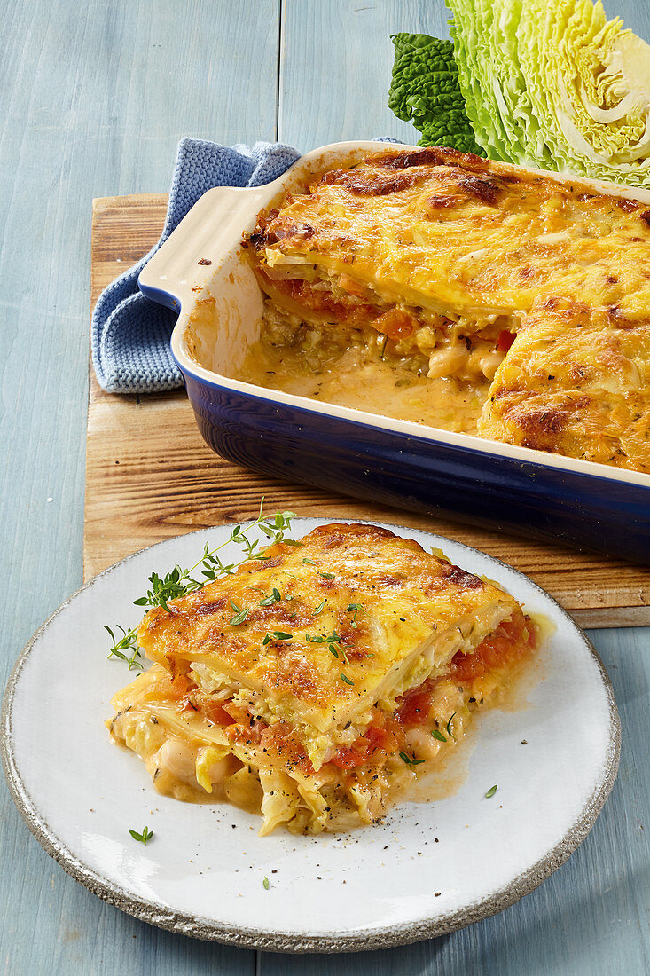 Savoy cabbage and potato lasagna with beans and tomato bechamel